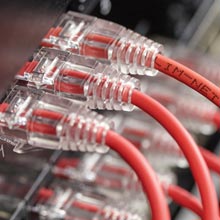 Slim-Net 28-AWG slim-net cables plugged into a server rack